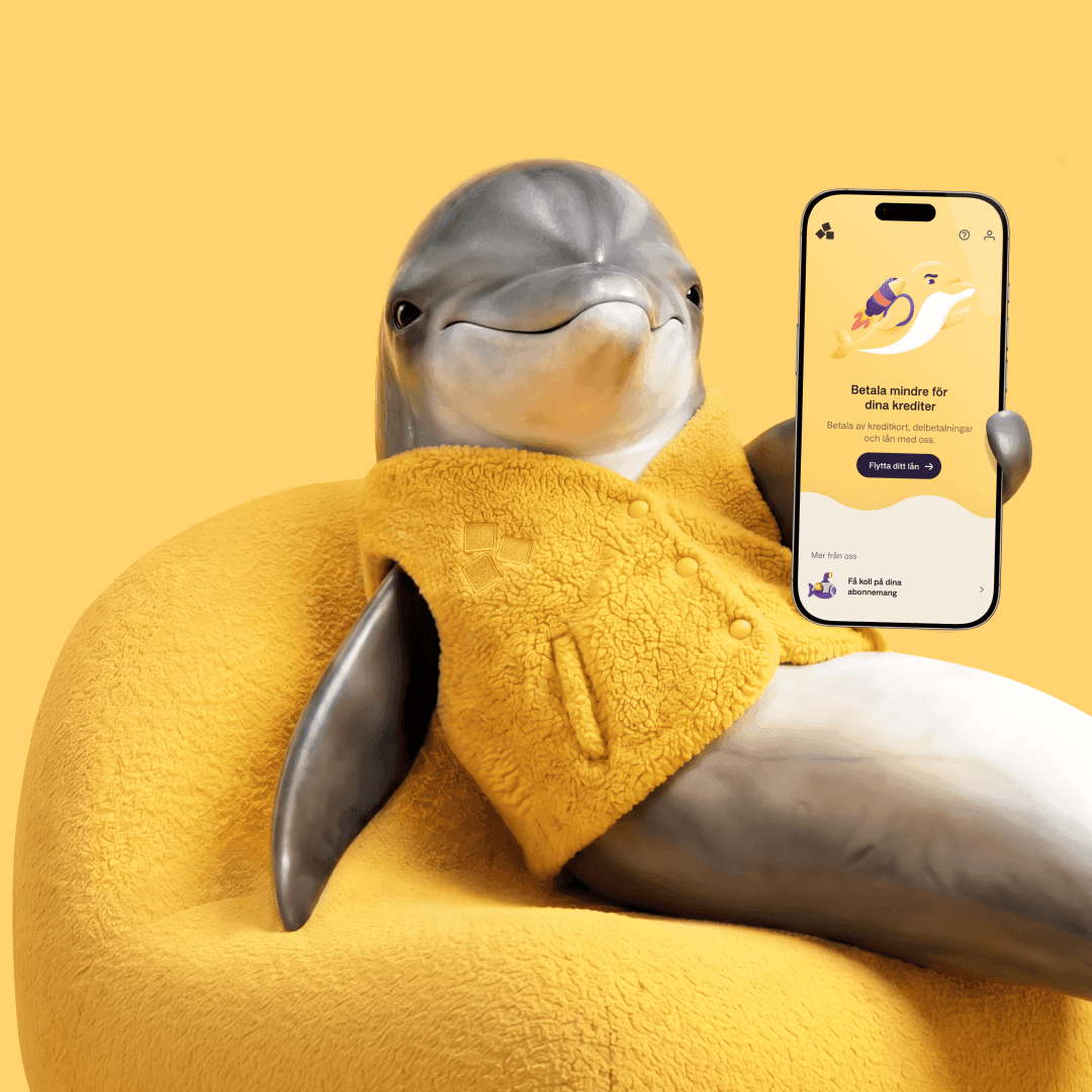 En delfin som håller upp en mobil och visar Anyfin-appen.