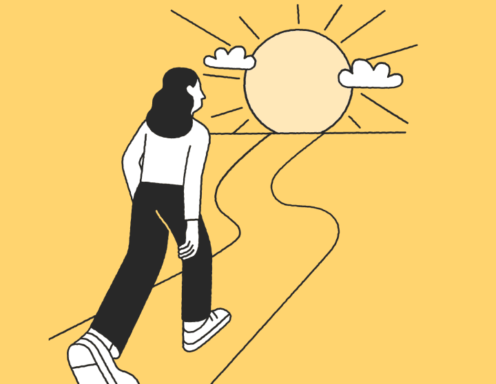 woman-walking-into-sunset